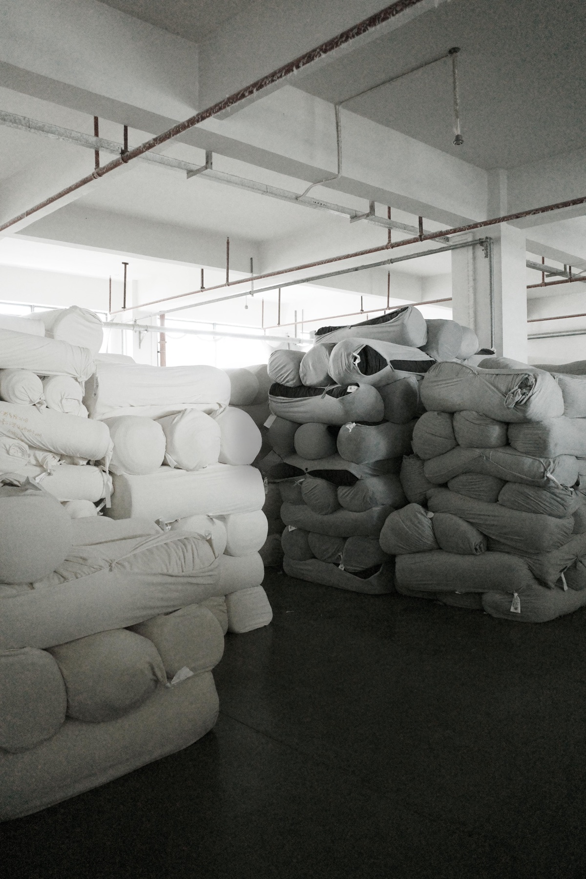 Fabric rolls and materials organized for production
