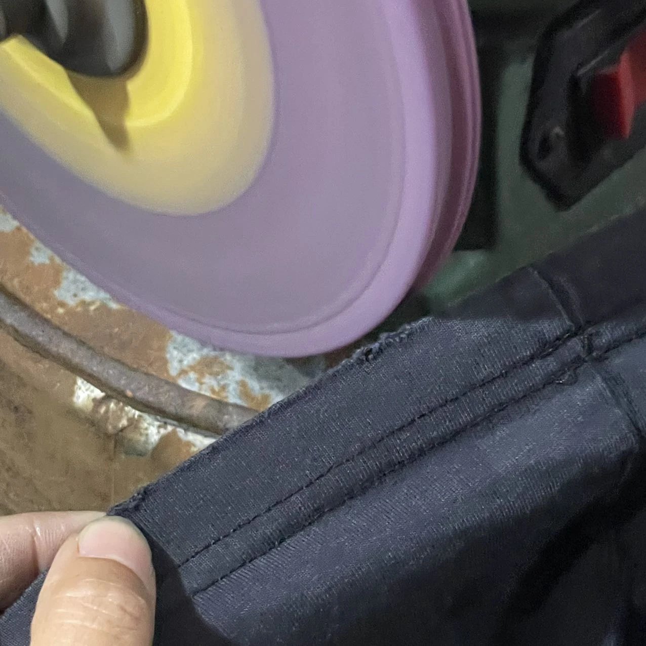 Hem at the abrasion wheel