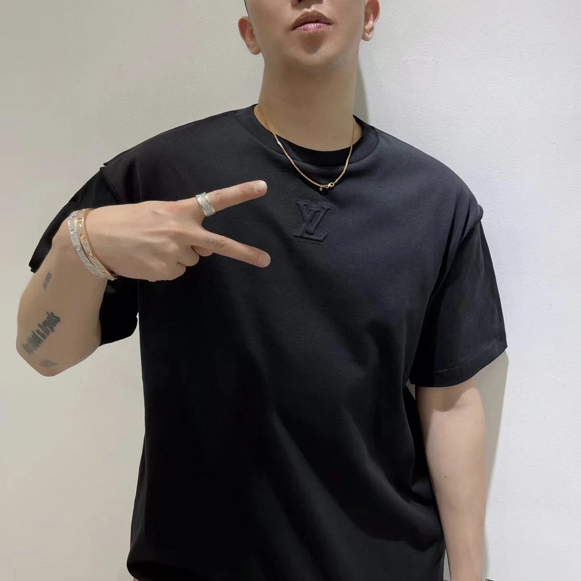 RD-C136 · Black Cotton T-Shirt with Embossed Relief Logo showcase view 1