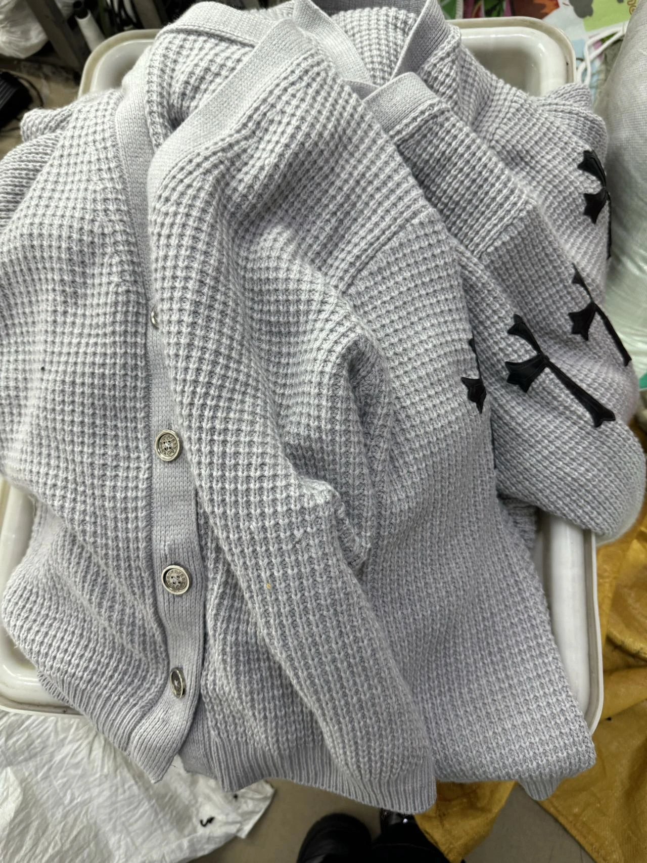 Grey cardigan stack