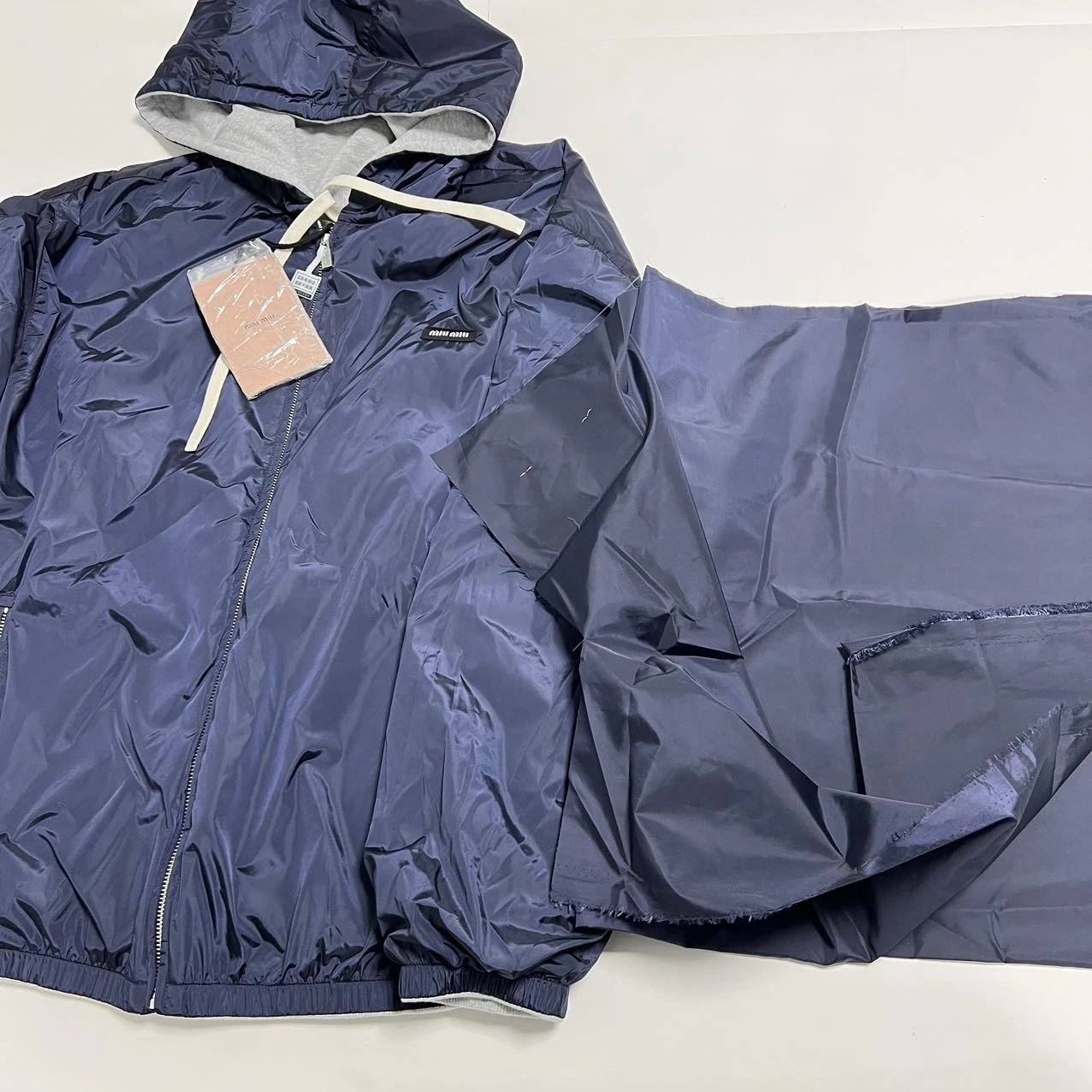 Navy garment and material piece