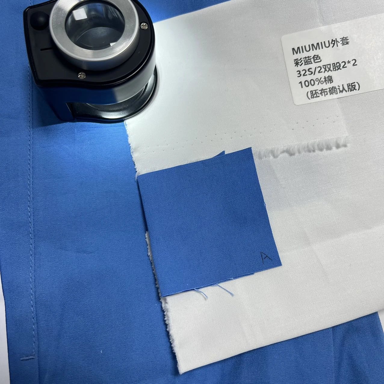 Physical fabric-swatch label