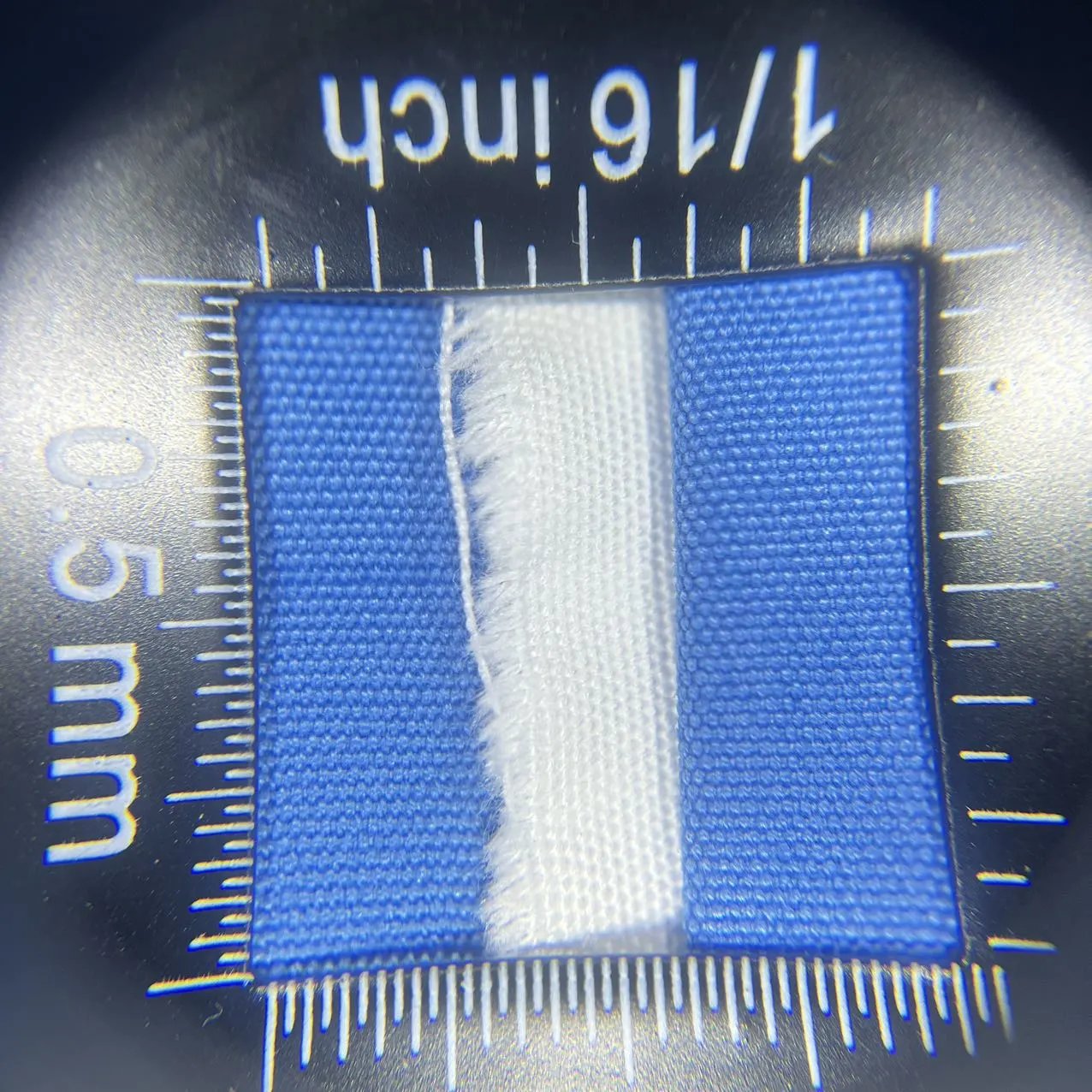 Magnified blue fabric