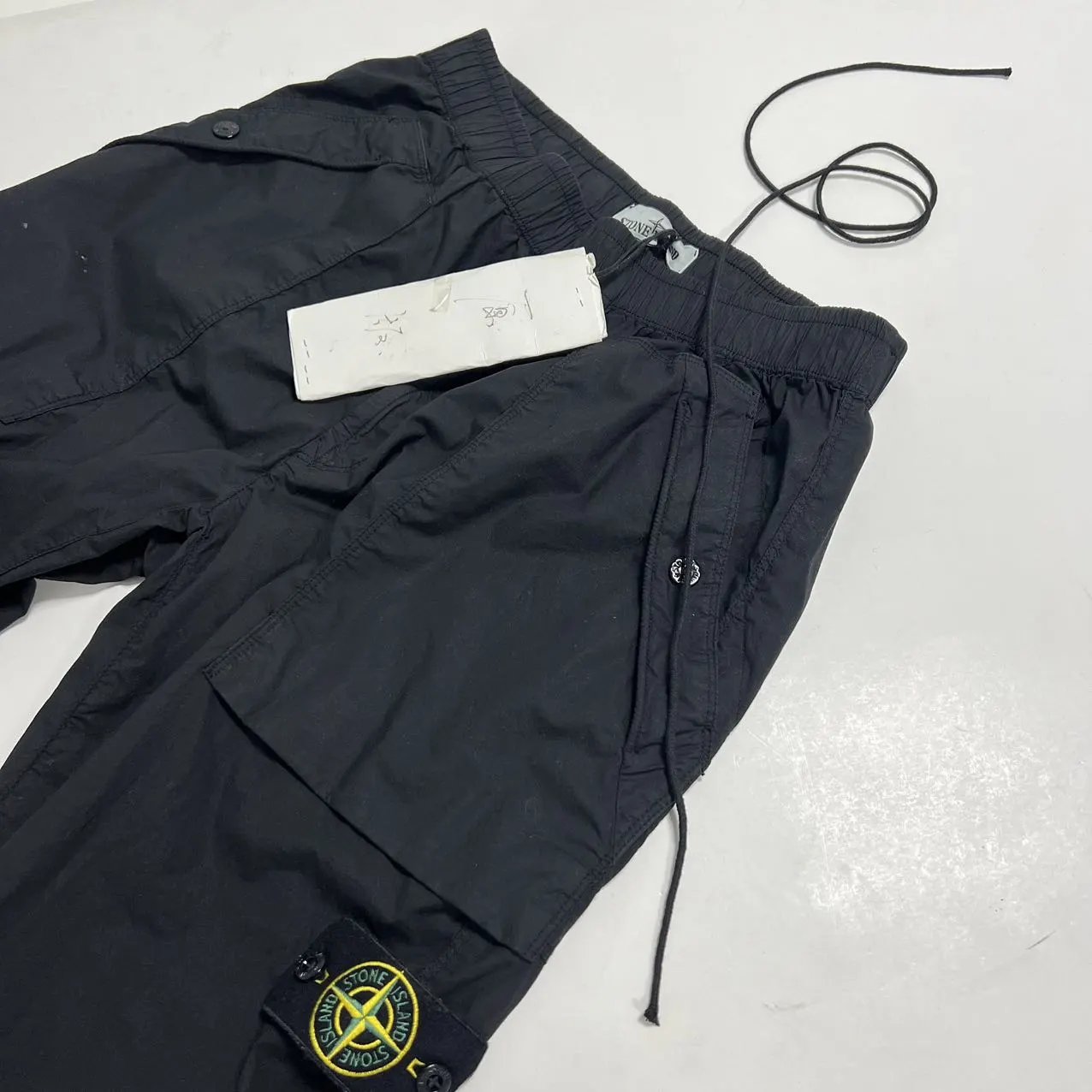 Garment and drawcord