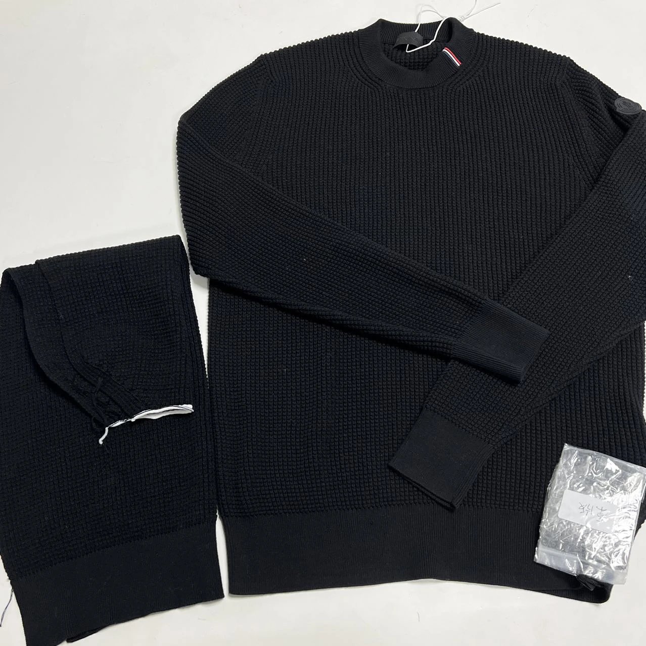 Garment and knit panel