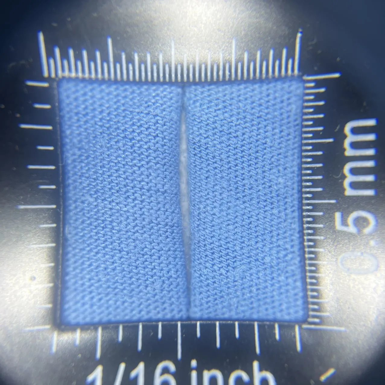 Magnified blue fabric