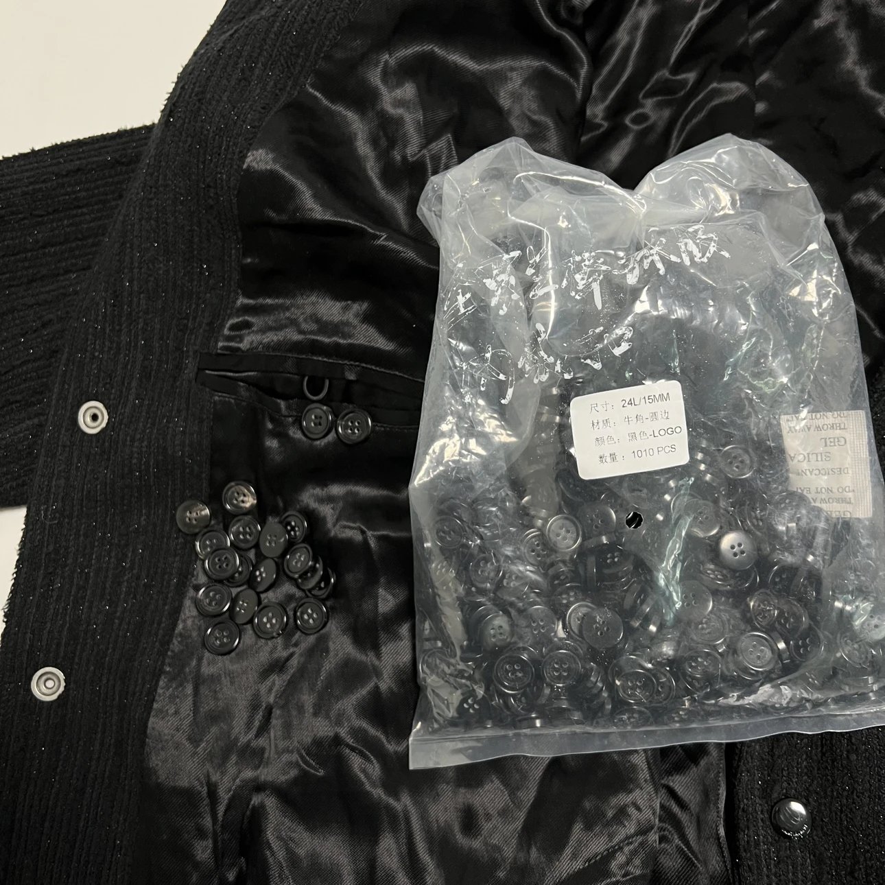 Loose buttons and jacket interior