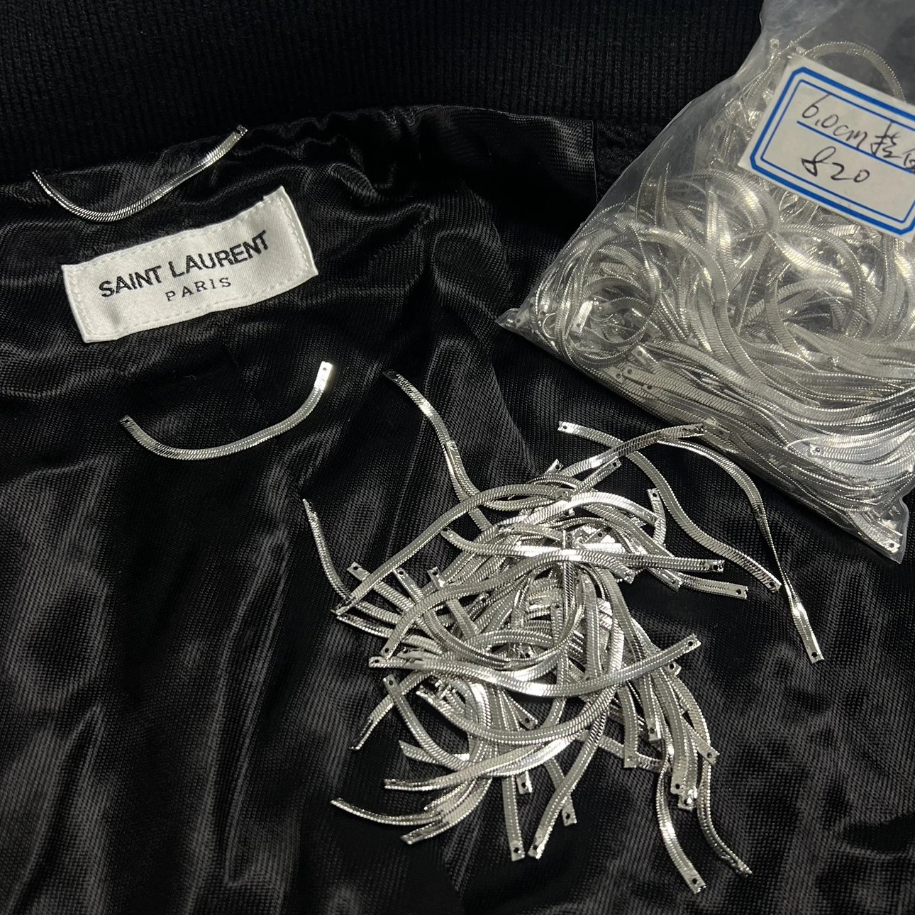 Hanging chains and neck label