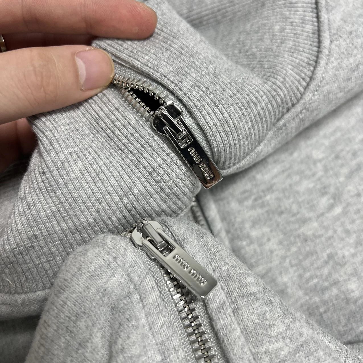 Front zipper-pull faces