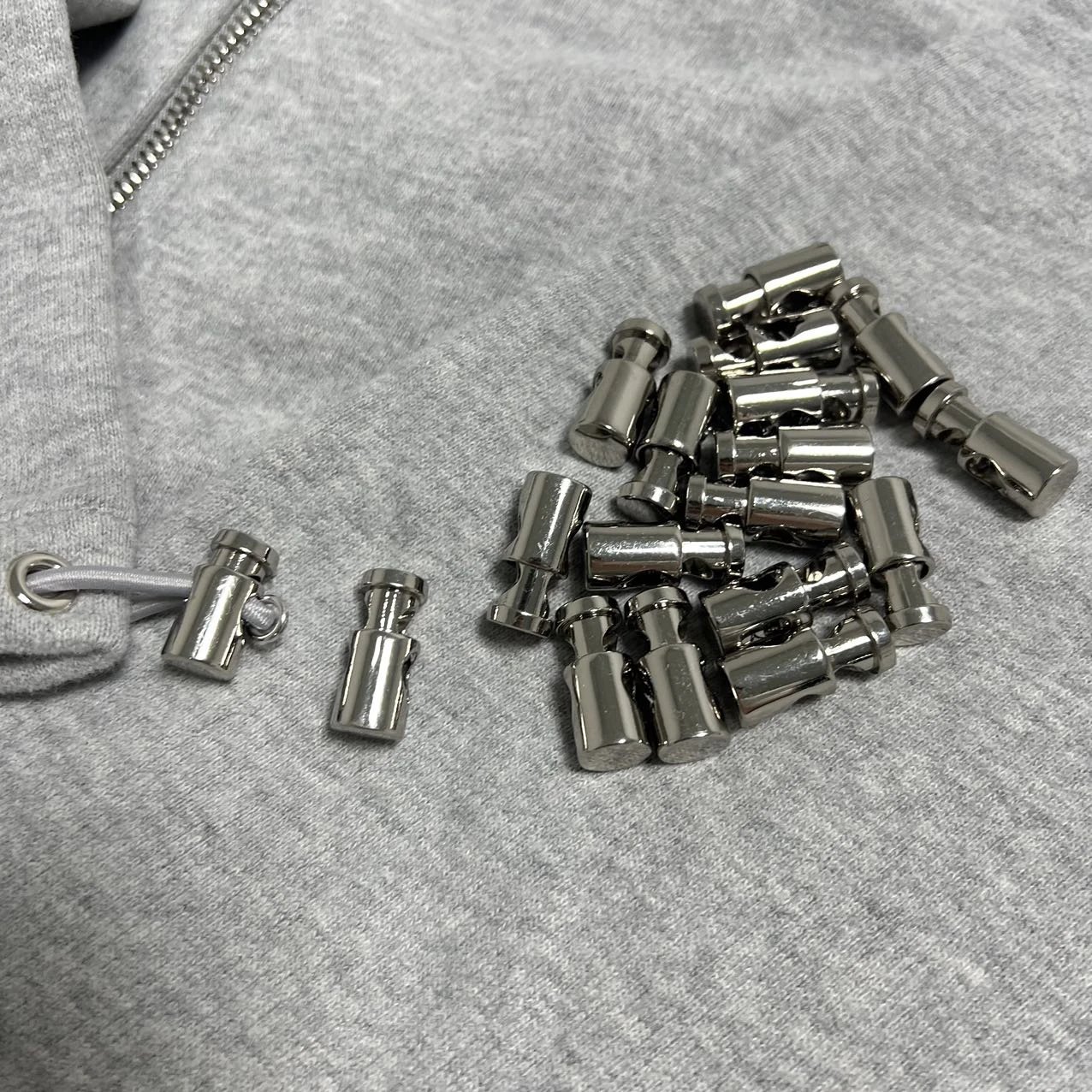 Metal cord locks
